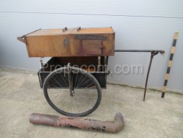 Cart with a stove for the sale of sausages