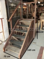 wooden stairs with railings