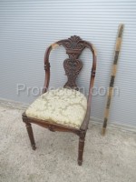 Upholstered chair carved