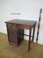 Dark brown desk with blinds