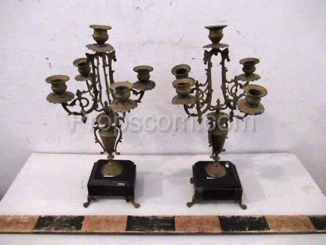 Forged four-branched candlesticks