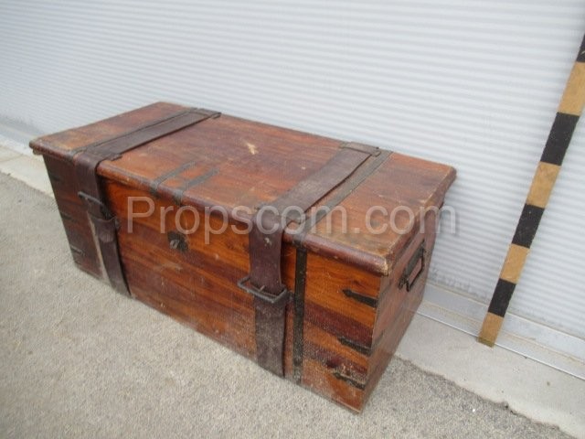 Forged wooden chest with leather belts