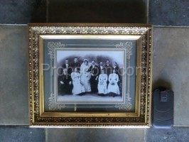 Wedding photos in a gold frame