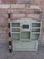 Wooden shelf with green cabinet