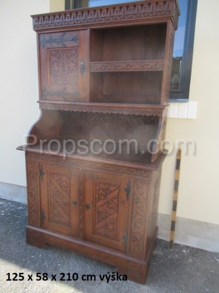 A massive carved medieval wooden cabinet