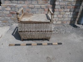 Wicker chair with storage space