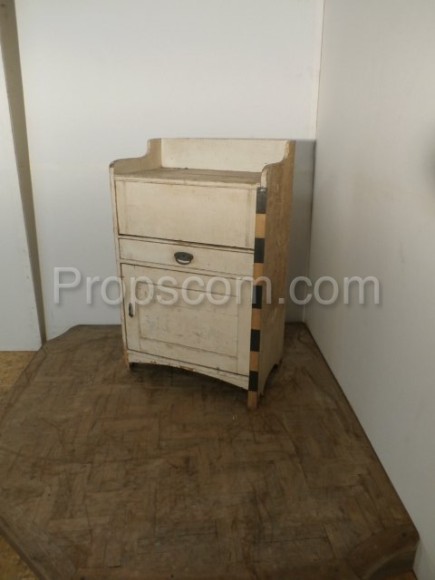 Cabinet with folding top plate