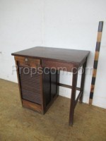 Dark brown desk with blinds