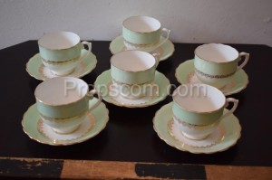 Cups with dessert plates