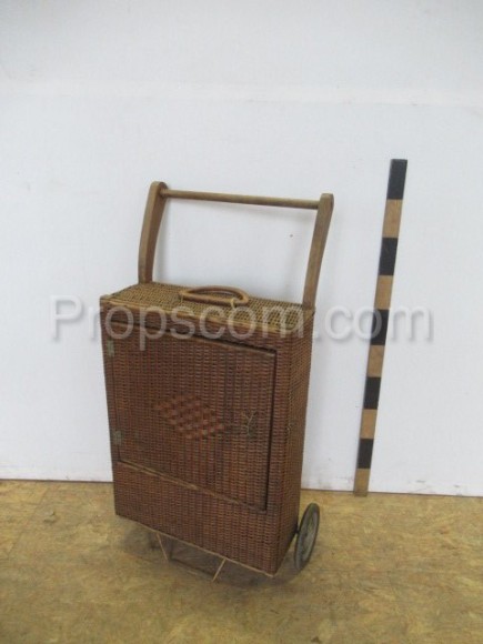 Wicker cabinet on wheels