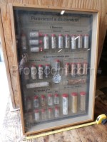 Fabric samples in a glass cabinet