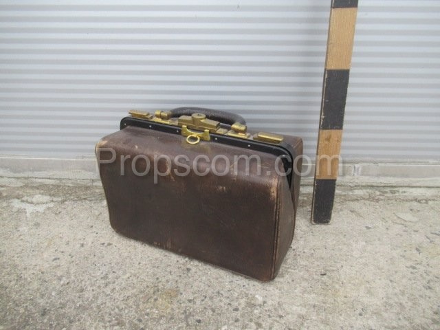 Brass travel suitcase