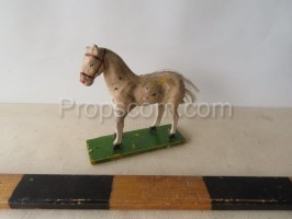 A smaller wooden horse