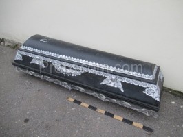 Black casket decorated