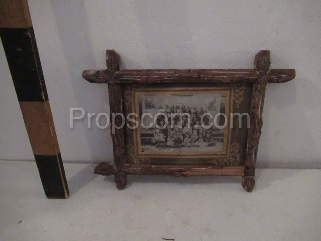 bulk photo of a probably farmhouse in a frame