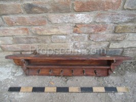 Wooden brown long shelf with hangers