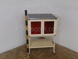 Mobile table with glass cabinet