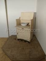 Cabinet with folding top plate