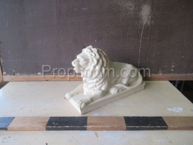 Porcelain lion statuette