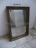 Mirror in a brass frame