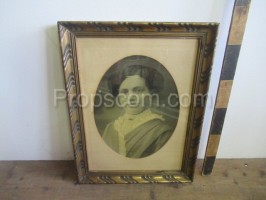 Photo of a woman glazed with a brass frame