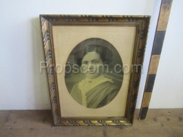 Photo of a woman glazed with a brass frame